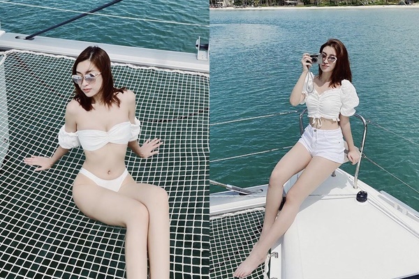 Hoa hậu Việt Nam 2016 chuộng những item mang sắc trắng khi tạo dáng trên du thuyền. (Ảnh: Instagram domylinh1310)